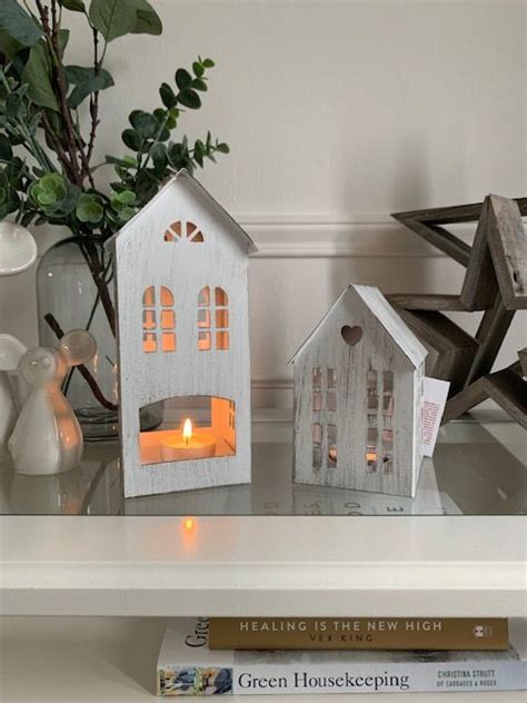 white metal tea light house